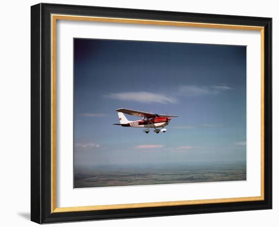 Cessna Skyhawk Flying-null-Framed Photographic Print