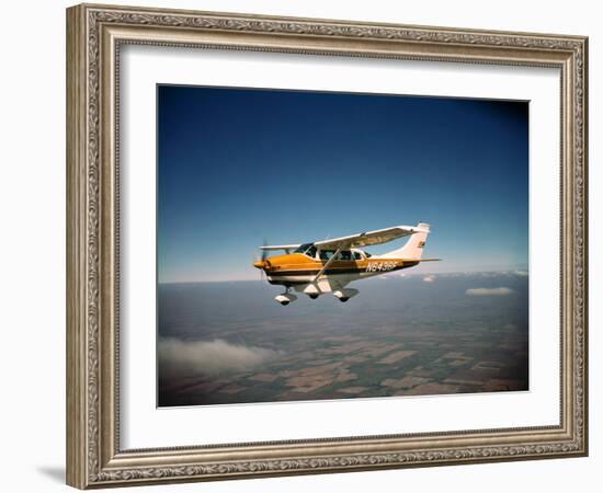 Cessna Superlobe Flying-null-Framed Photographic Print