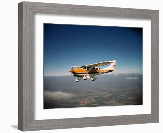 Cessna Superlobe Flying-null-Framed Photographic Print