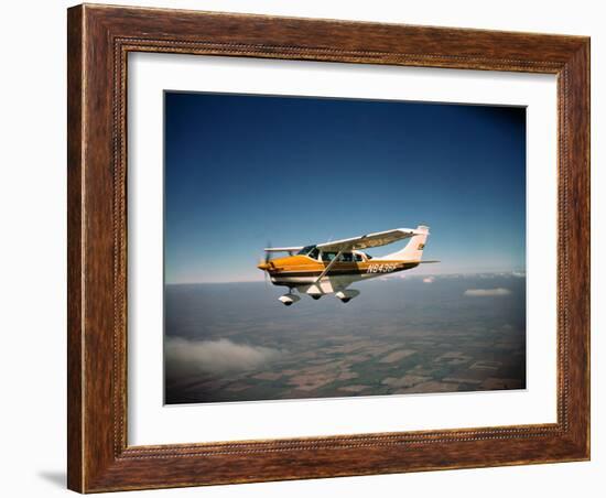 Cessna Superlobe Flying-null-Framed Photographic Print