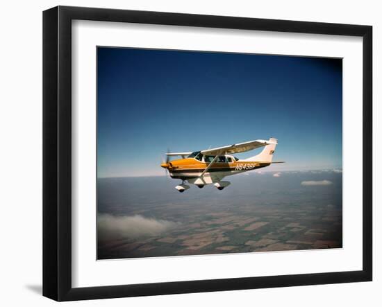 Cessna Superlobe Flying-null-Framed Photographic Print