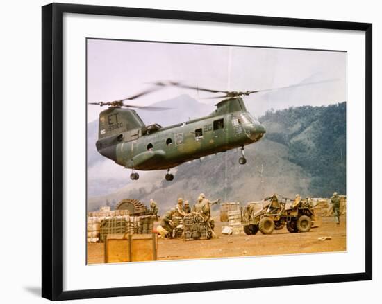 Ch-46 Helicopter Picking up Supplies-null-Framed Photographic Print