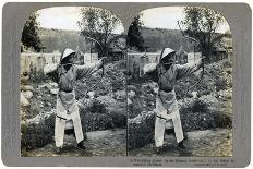 Chinese Prisoner in the Cangue Placarded with the Record of His Crime, China, 1902-CH Graves-Photographic Print