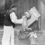 Feeding a Prisoner Wearing a Cangue, China, 1902-CH Graves-Photographic Print