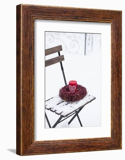 Chair in the Snow with Candle and Wreath-Andrea Haase-Framed Photographic Print