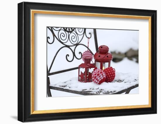 Chair in the Snow with Lantern, Balls from Cord Material-Andrea Haase-Framed Photographic Print