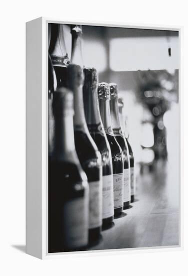 Champagne Bottles in a Row-Walter Bibikow-Framed Premier Image Canvas