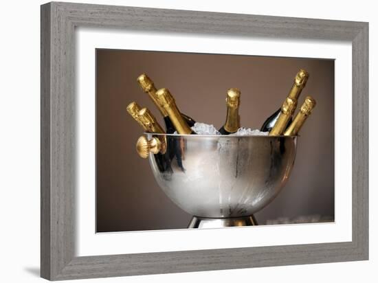 Champagne Bottles in an Ice Bucket-null-Framed Photo