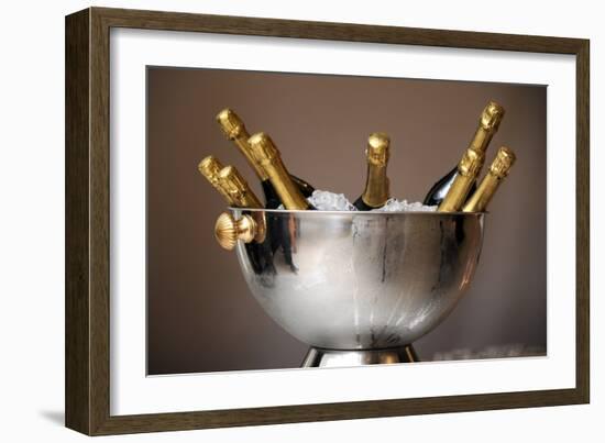 Champagne Bottles in an Ice Bucket-null-Framed Photo