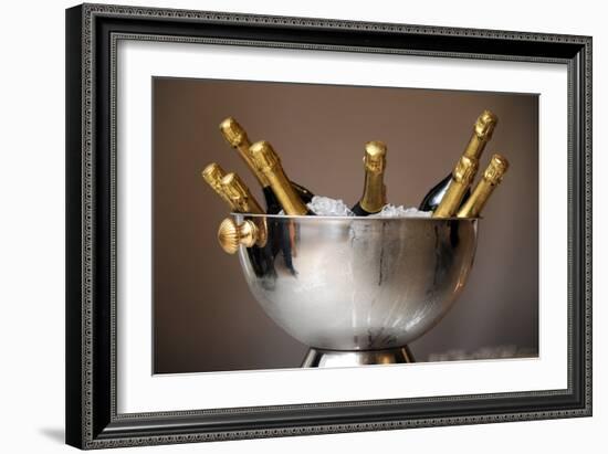 Champagne Bottles in an Ice Bucket-null-Framed Photo