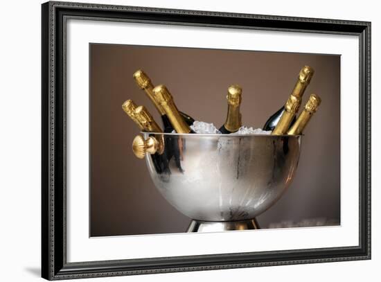 Champagne Bottles in an Ice Bucket-null-Framed Photo