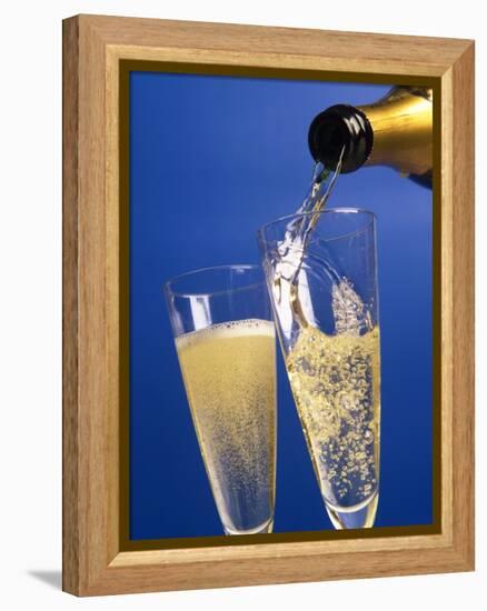 Champagne glass and bottle-null-Framed Premier Image Canvas