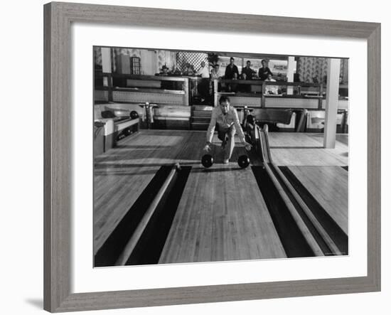 Champion Bowler Andy Varipapa Demonstrating Favorite Trick of Rolling Two Balls Down Alley at once-Gjon Mili-Framed Premium Photographic Print