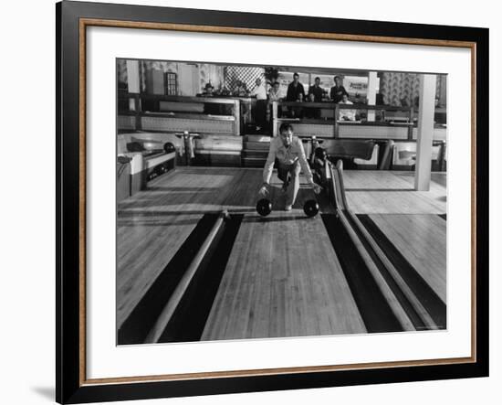 Champion Bowler Andy Varipapa Demonstrating Favorite Trick of Rolling Two Balls Down Alley at once-Gjon Mili-Framed Premium Photographic Print