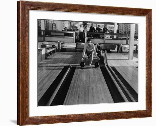 Champion Bowler Andy Varipapa Demonstrating Favorite Trick of Rolling Two Balls Down Alley at once-Gjon Mili-Framed Premium Photographic Print