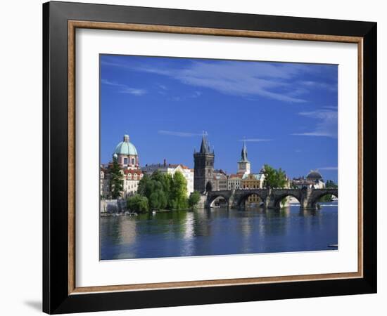 Charles Bridge over the Vltava River and City Skyline of Prague, Czech Republic, Europe-Nigel Francis-Framed Photographic Print