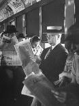 Commuters Sitting on a Train and Reading the Chicago Tribune-Charles E^ Steinheimer-Framed Photographic Print
