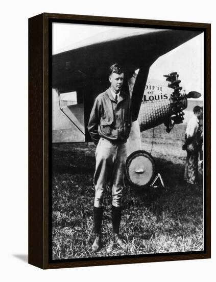 Charles Lindbergh in Front of His Airplane-null-Framed Premier Image Canvas