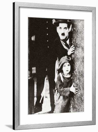 Charlie Chaplin and Jackie Coogan in 'The Kid', 1920-null-Framed Photographic Print