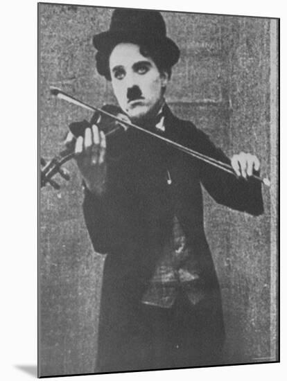 Charlie Chaplin as a Street Musician in The Vagabond-null-Mounted Premium Photographic Print