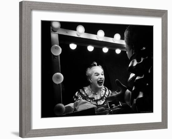 Charlie Chaplin at Dressing Room Mirror, Giving Himself a Wide Grin-W^ Eugene Smith-Framed Premium Photographic Print