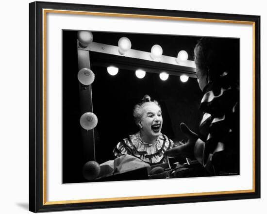 Charlie Chaplin at Dressing Room Mirror, Giving Himself a Wide Grin-W^ Eugene Smith-Framed Premium Photographic Print