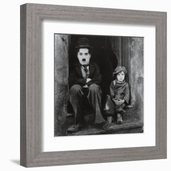 Charlie Chaplin in The Kid-null-Framed Art Print