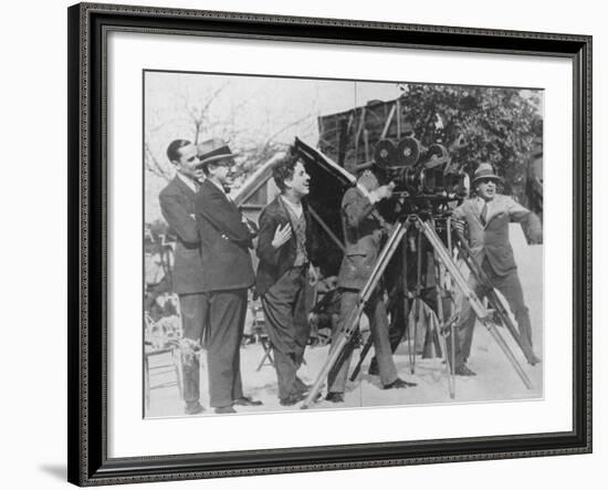 Charlie Chaplin Laughing During Shooting of Film-null-Framed Premium Photographic Print