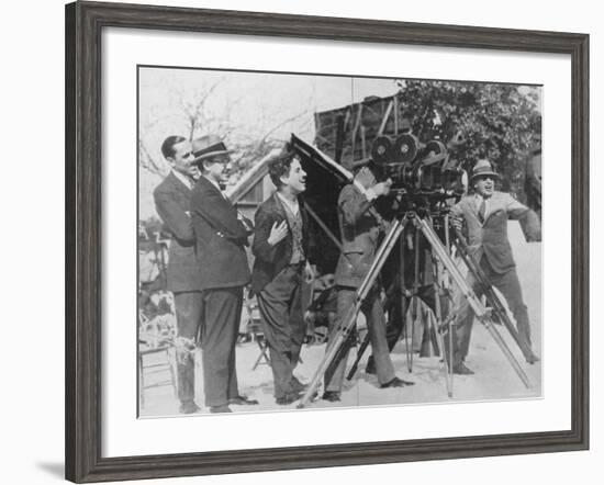 Charlie Chaplin Laughing During Shooting of Film-null-Framed Premium Photographic Print