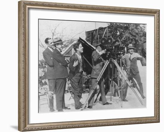 Charlie Chaplin Laughing During Shooting of Film-null-Framed Premium Photographic Print