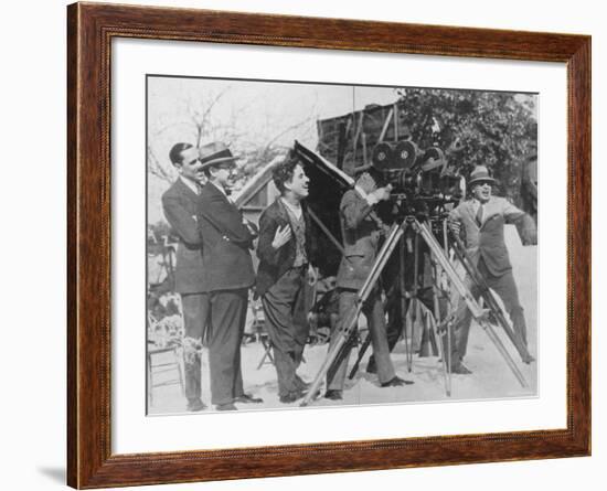 Charlie Chaplin Laughing During Shooting of Film-null-Framed Premium Photographic Print