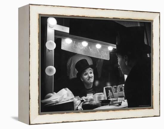 Charlie Chaplin Looking Into Mirror, Putting on Makeup for Role as the Animal Trainer-W^ Eugene Smith-Framed Premier Image Canvas