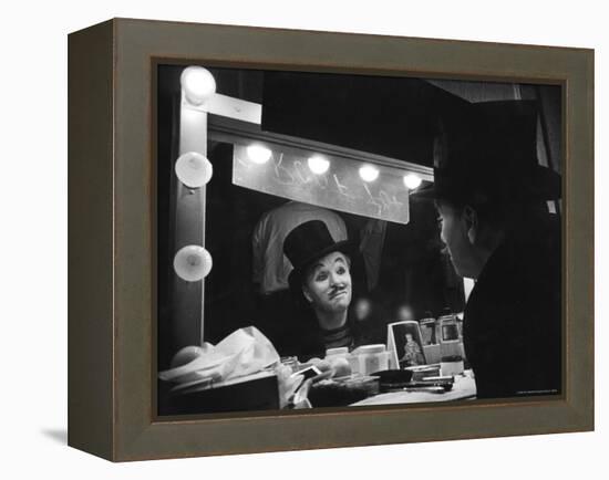 Charlie Chaplin Looking Into Mirror, Putting on Makeup for Role as the Animal Trainer-W^ Eugene Smith-Framed Premier Image Canvas