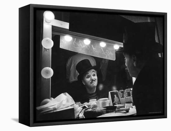 Charlie Chaplin Looking Into Mirror, Putting on Makeup for Role as the Animal Trainer-W^ Eugene Smith-Framed Premier Image Canvas