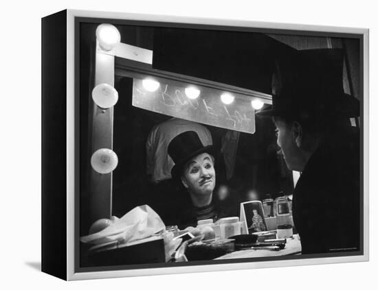 Charlie Chaplin Looking Into Mirror, Putting on Makeup for Role as the Animal Trainer-W^ Eugene Smith-Framed Premier Image Canvas