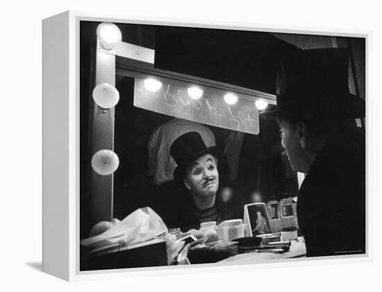 Charlie Chaplin Looking Into Mirror, Putting on Makeup for Role as the Animal Trainer-W^ Eugene Smith-Framed Premier Image Canvas