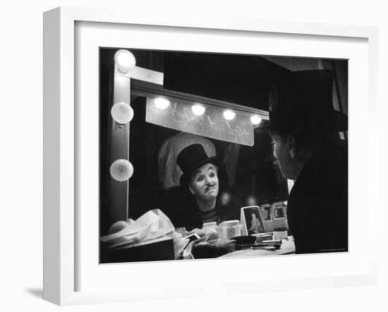 Charlie Chaplin Looking Into Mirror, Putting on Makeup for Role as the Animal Trainer-W^ Eugene Smith-Framed Premium Photographic Print