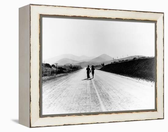 Charlie Chaplin, Paulette Goddard. "The Masses" 1936, "Modern Times" Directed by Charles Chaplin-null-Framed Premier Image Canvas