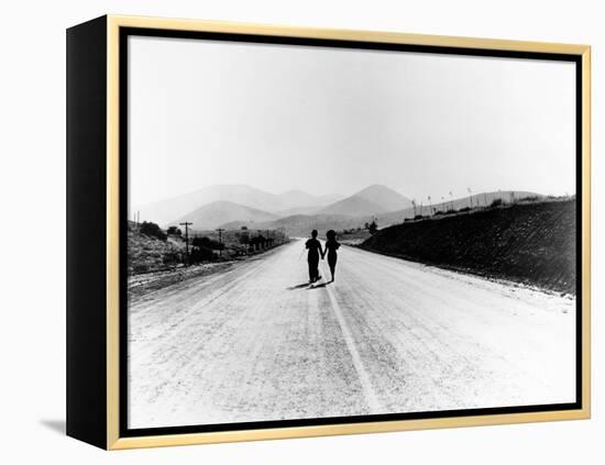 Charlie Chaplin, Paulette Goddard. "The Masses" 1936, "Modern Times" Directed by Charles Chaplin-null-Framed Premier Image Canvas