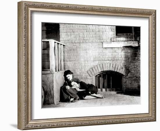 Charlie Chaplin, Paulette Goddard. "The Masses" 1936, "Modern Times" Directed by Charles Chaplin-null-Framed Photographic Print