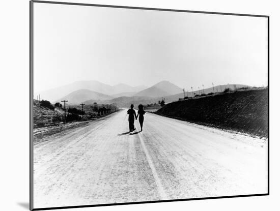 Charlie Chaplin, Paulette Goddard. "The Masses" 1936, "Modern Times" Directed by Charles Chaplin-null-Mounted Photographic Print