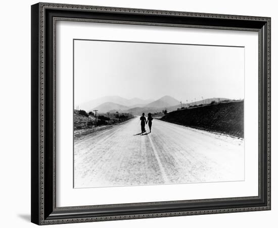 Charlie Chaplin, Paulette Goddard. "The Masses" 1936, "Modern Times" Directed by Charles Chaplin-null-Framed Photographic Print