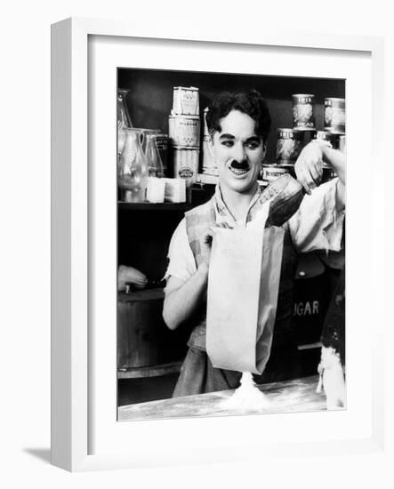 Charlie Chaplin. "Shop" 1916, "The Floorwalker" Directed by Charles Chaplin-null-Framed Photographic Print