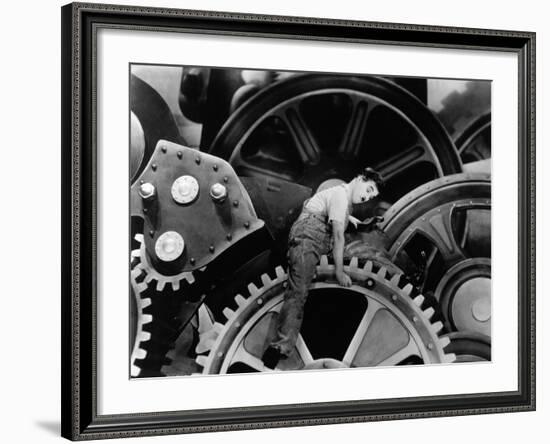 Charlie Chaplin. "The Masses" 1936, "Modern Times" Directed by Charles Chaplin-null-Framed Photographic Print