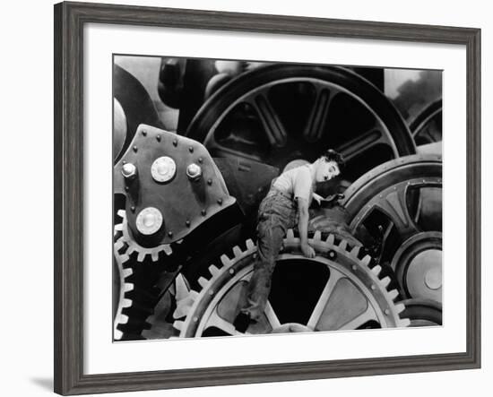 Charlie Chaplin. "The Masses" 1936, "Modern Times" Directed by Charles Chaplin-null-Framed Photographic Print