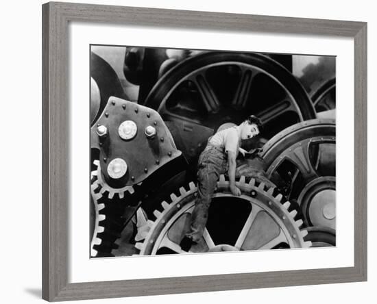 Charlie Chaplin. "The Masses" 1936, "Modern Times" Directed by Charles Chaplin-null-Framed Photographic Print