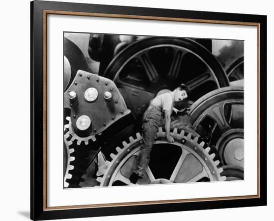 Charlie Chaplin. "The Masses" 1936, "Modern Times" Directed by Charles Chaplin-null-Framed Photographic Print