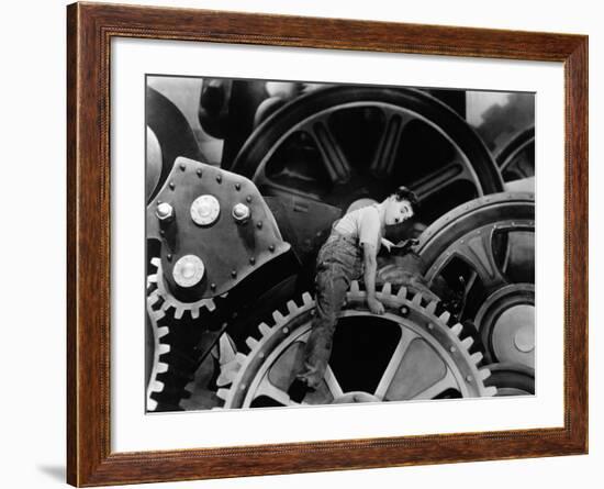 Charlie Chaplin. "The Masses" 1936, "Modern Times" Directed by Charles Chaplin-null-Framed Photographic Print