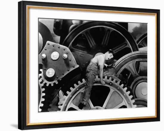 Charlie Chaplin. "The Masses" 1936, "Modern Times" Directed by Charles Chaplin-null-Framed Photographic Print