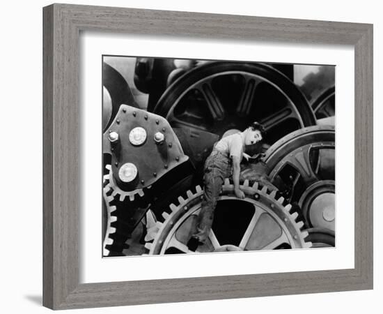 Charlie Chaplin. "The Masses" 1936, "Modern Times" Directed by Charles Chaplin-null-Framed Photographic Print